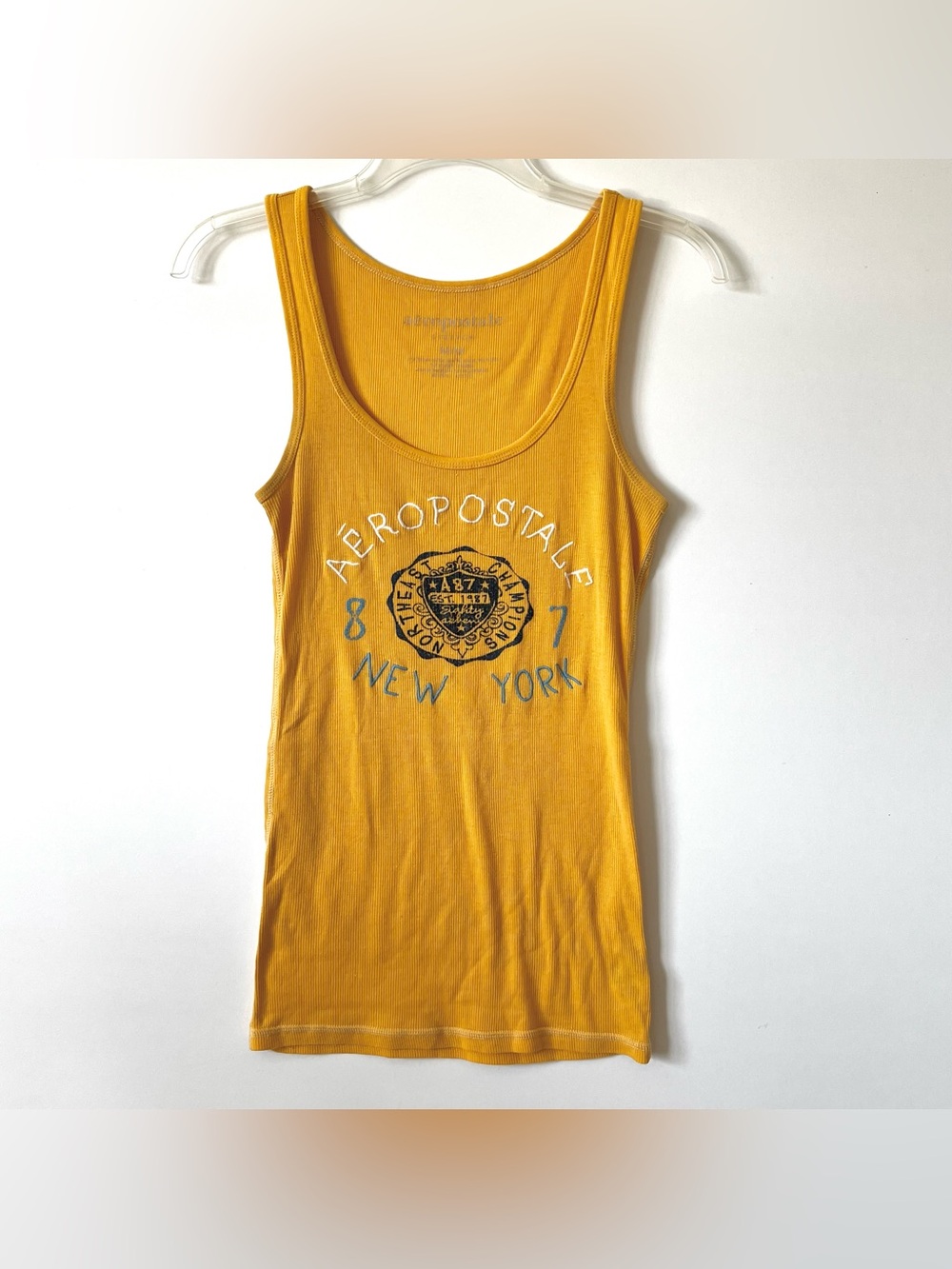 ✺(^O^)✺

Aeropostale Yellow Ribbed Graphic Tank Top